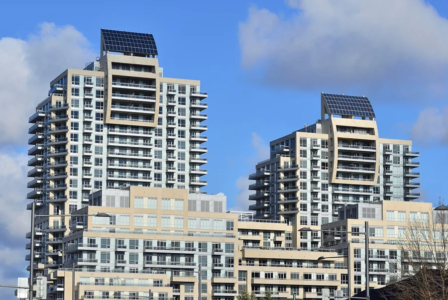 Residential apartment towers with solar panels on the rooftops