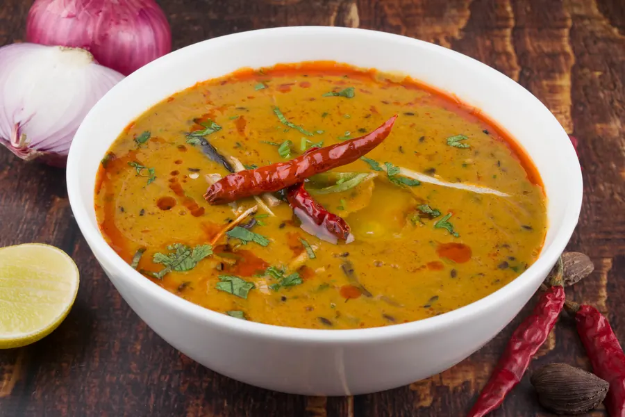 Spices sizzling in a pan during cooking